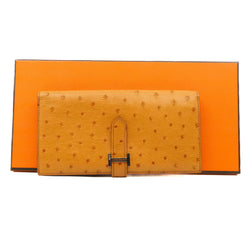 bearn long wallet in ostrich gold A stamp