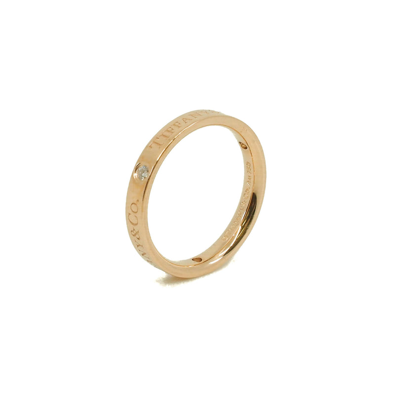 T&CO.® band ring in 18k rose gold with round brilliant diamonds. 3 mm wide. Carat total weight .07 size 6 rrp2700