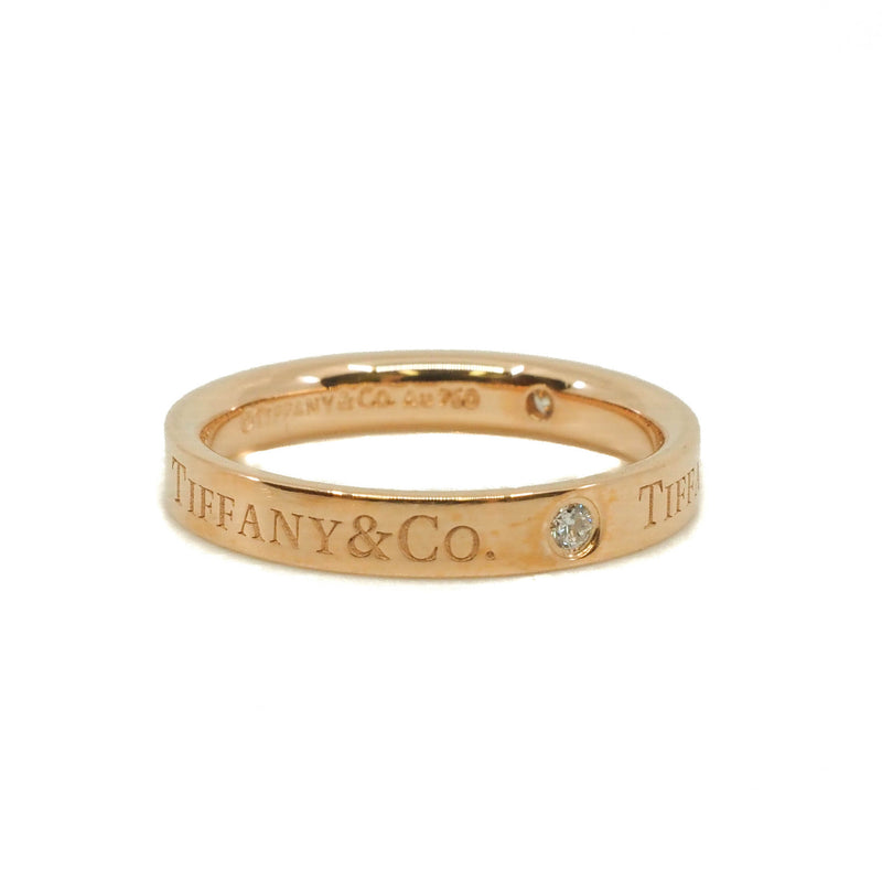 T&CO.® band ring in 18k rose gold with round brilliant diamonds. 3 mm wide. Carat total weight .07 size 6 rrp2700
