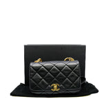 thumbnail flap bag in black lambskin with chain top handle #KNG2XXXX