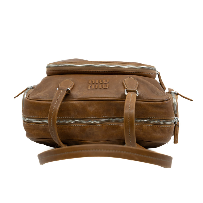nappa pocket bag with top handle in leather brown