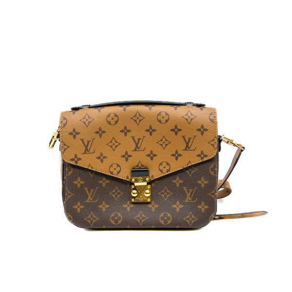 pochette metis in monogram reverse canvas ghw