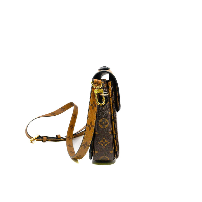 pochette metis in monogram reverse canvas ghw