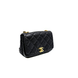 thumbnail flap bag in black lambskin with chain top handle #KNG2XXXX