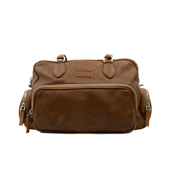 nappa pocket bag with top handle in leather brown