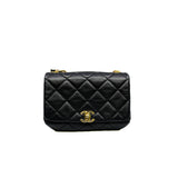 thumbnail flap bag in black lambskin with chain top handle #KNG2XXXX