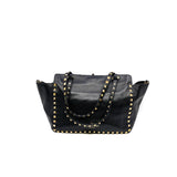 thumbnail small rockstud trapeze in black grained calfskin ghw