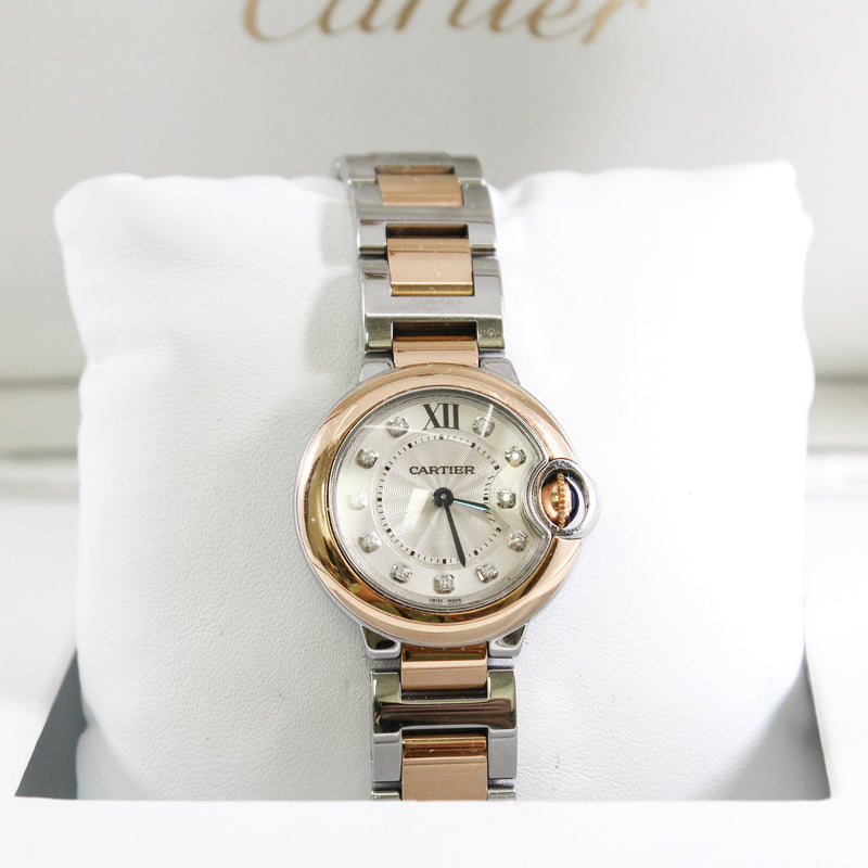 cartier ballon #28 has12 diamonds inside with yellow&white steel strip
