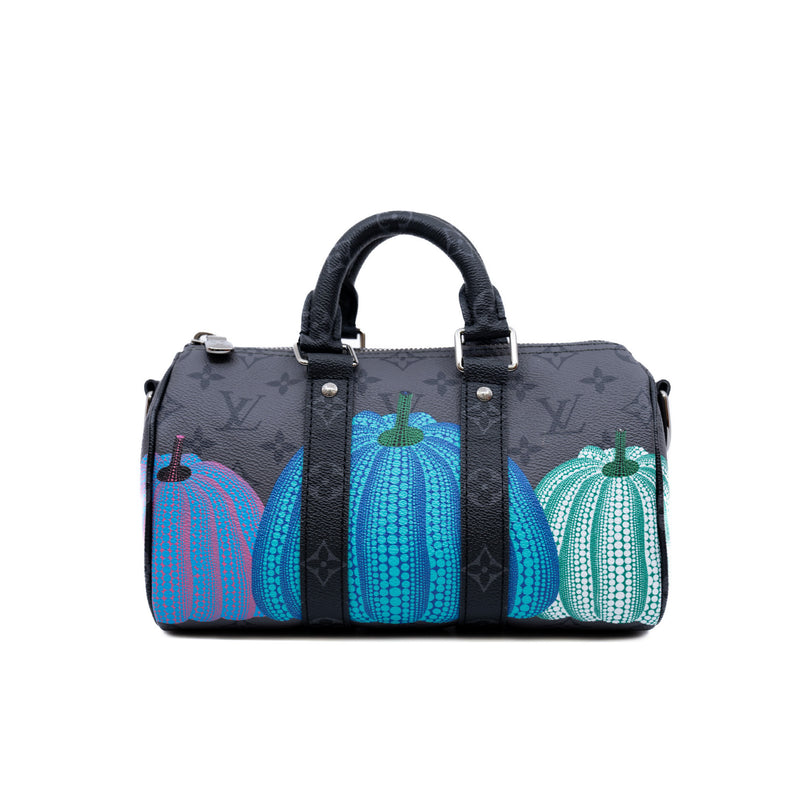 LVxYK keepall pumpkin in Eclipse Reverse canvas - L'UXE LINK
