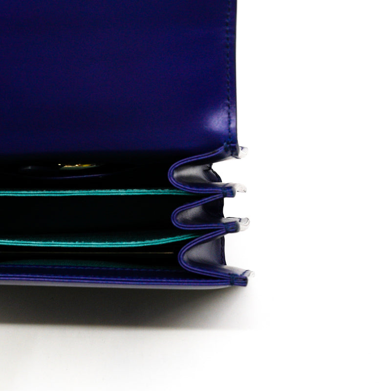 small serpenti top handle flap bag in stingray navy