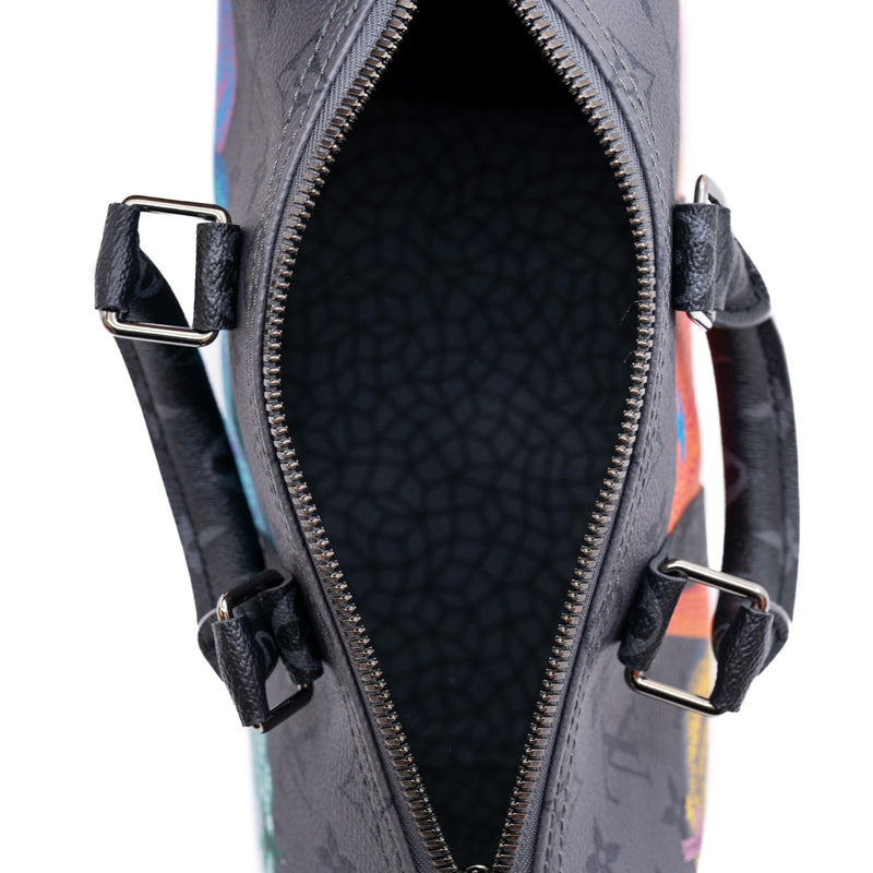 LVxYK keepall pumpkin in Eclipse Reverse canvas - L'UXE LINK