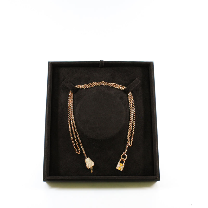 18k rg long necklace with bag charm and key with diamonds rrp50715