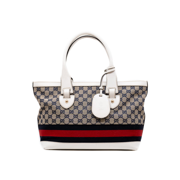 fabric tote with white leather