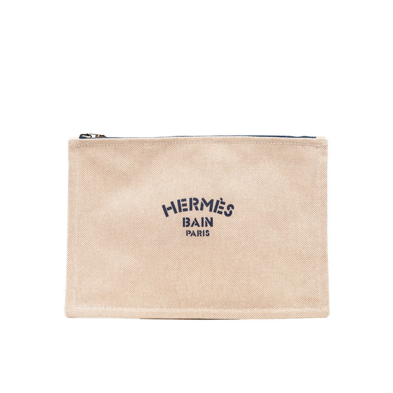 zippy clutch in fabric beige