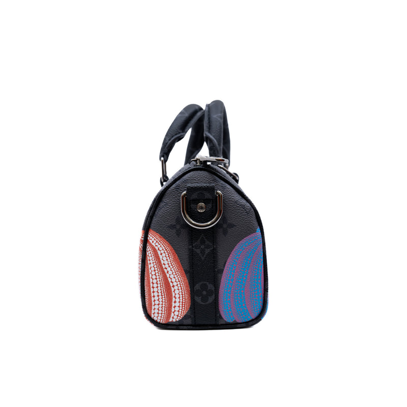 LVxYK keepall pumpkin in Eclipse Reverse canvas - L'UXE LINK