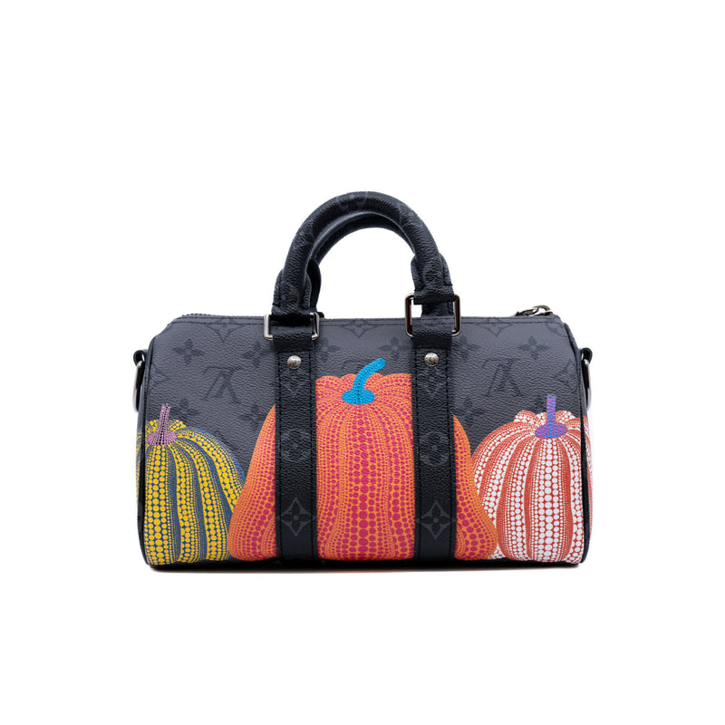 LVxYK keepall pumpkin in Eclipse Reverse canvas - L'UXE LINK