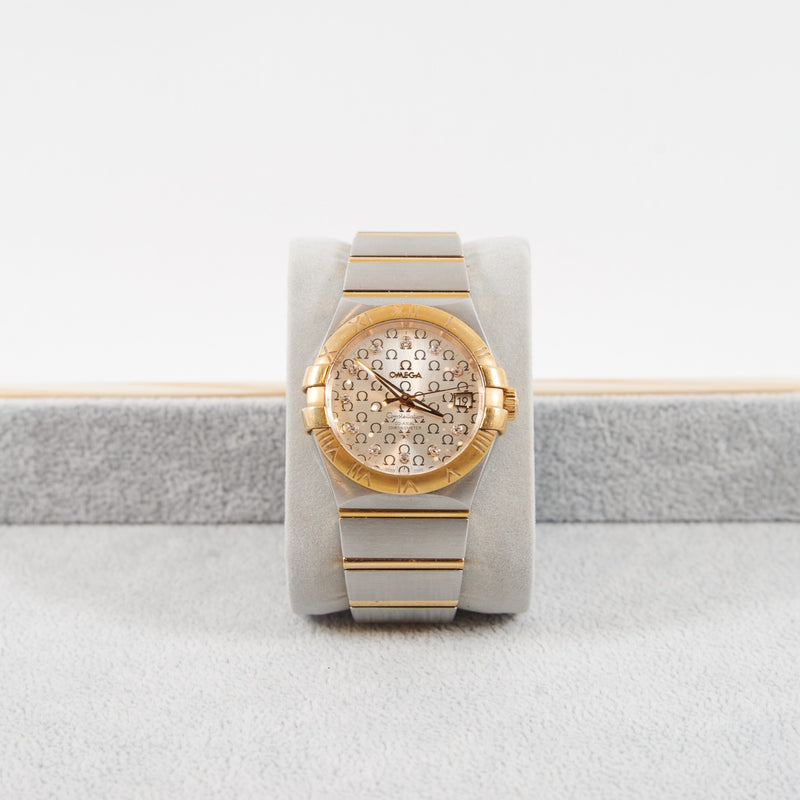 omega watch men with diamond around omaga logo background - L'UXE LINK