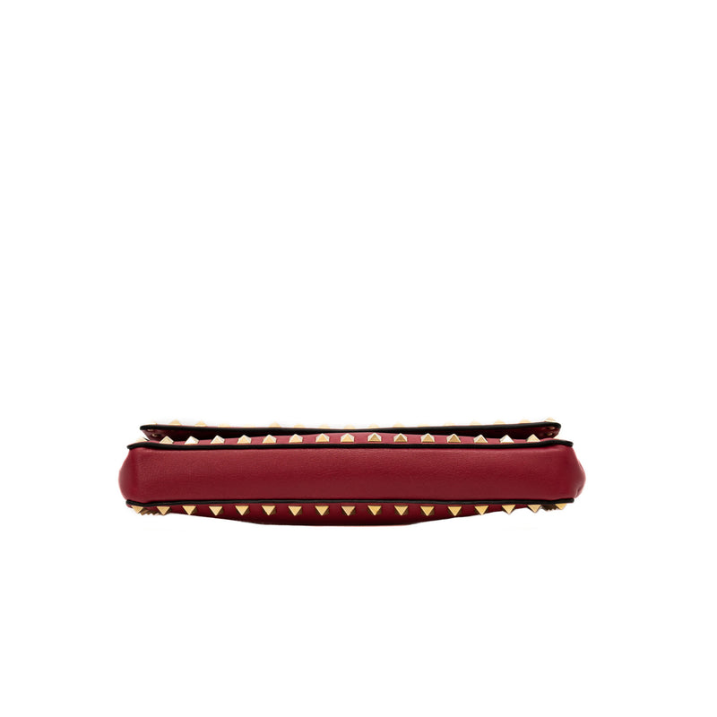 long clutch with stads bangle handle in leather rosepink ghw
