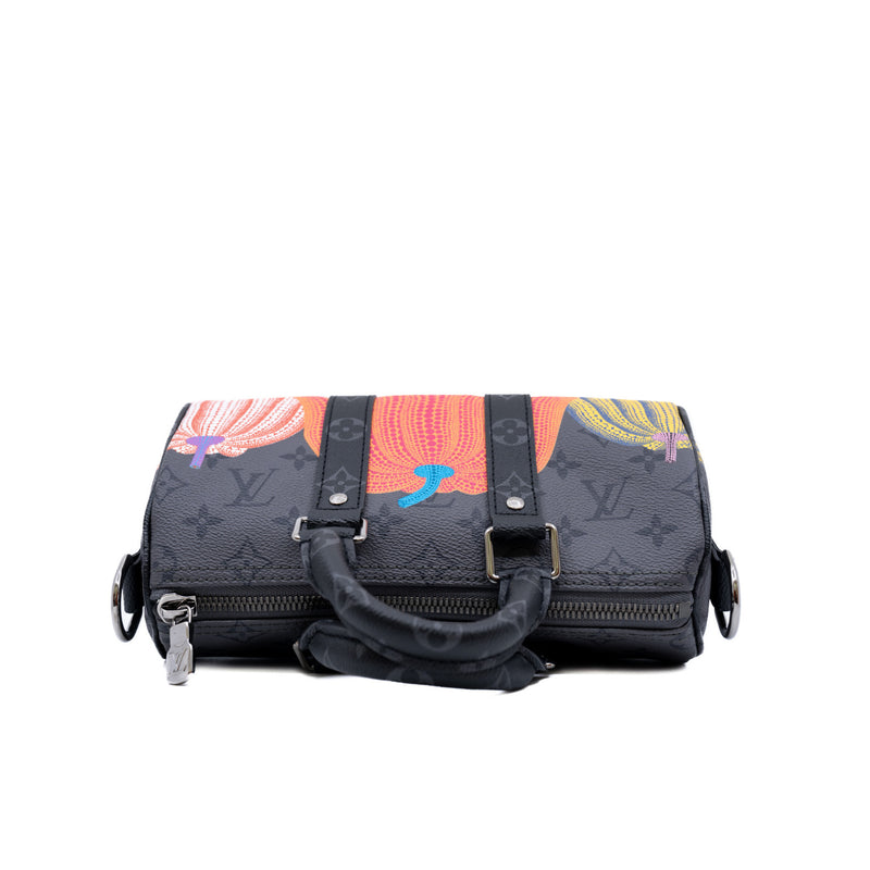 LVxYK keepall pumpkin in Eclipse Reverse canvas - L'UXE LINK