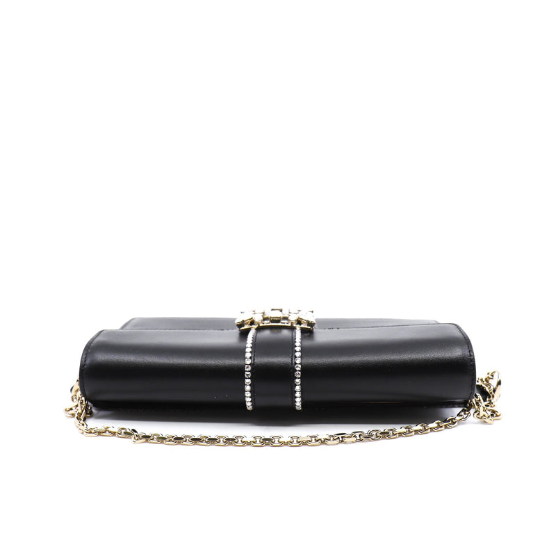 strass buckle flap crossbody bag in leather black