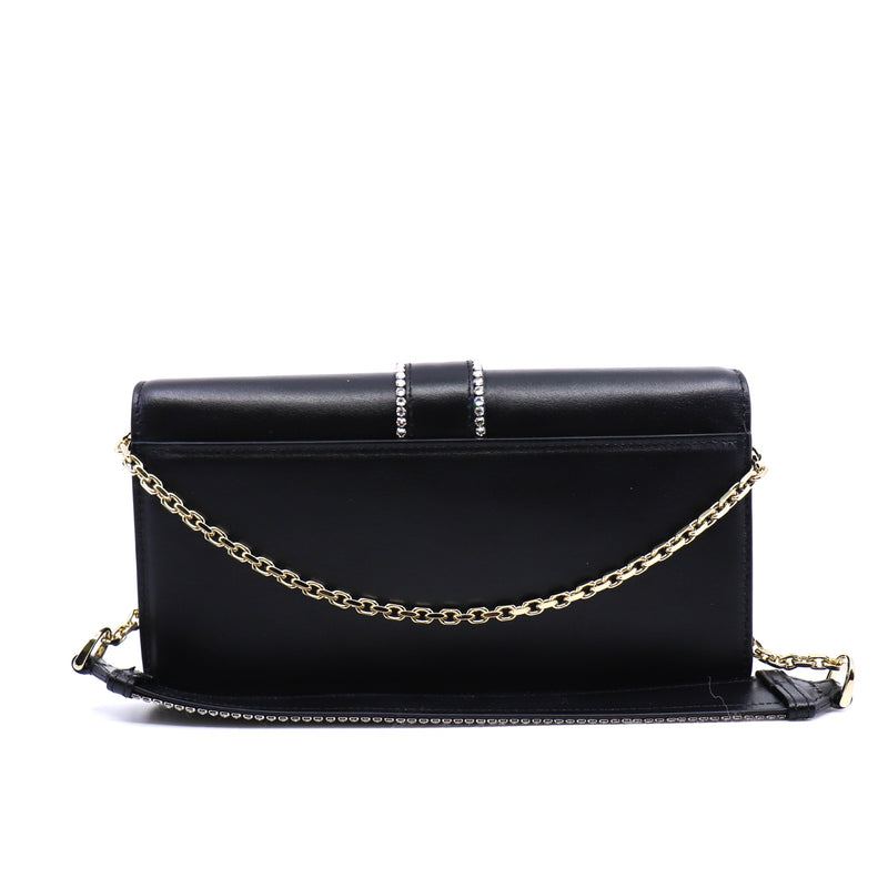 strass buckle flap crossbody bag in leather black