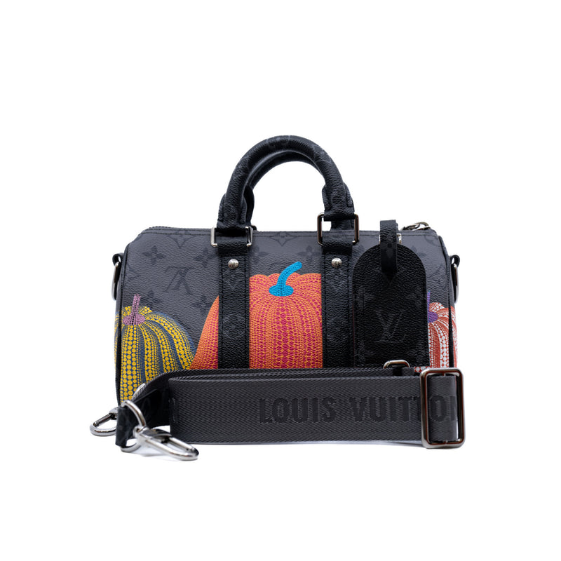 LVxYK keepall pumpkin in Eclipse Reverse canvas - L'UXE LINK