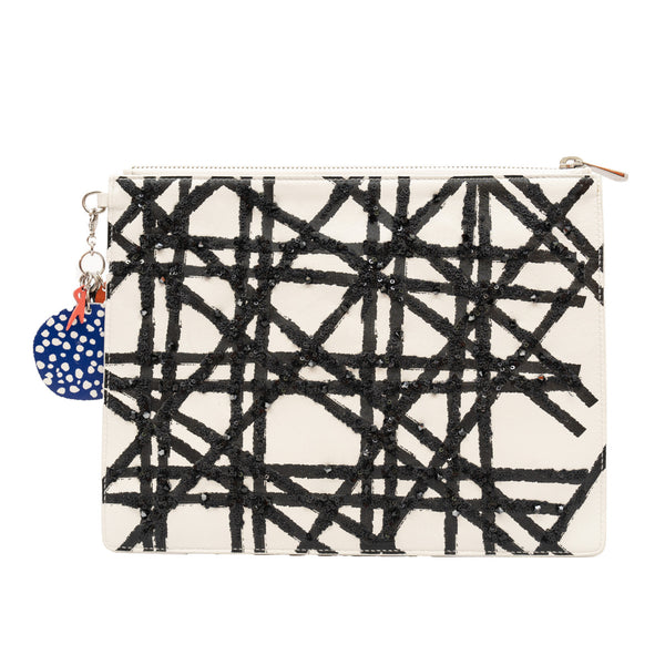 dior clutch white with black paillette lines